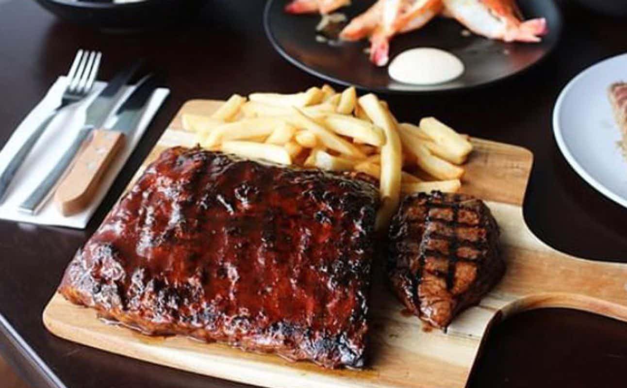 Enjoy Grill & Barbeque, Steakhouse, Australian, Gluten Free Options, Restaurant, Indoor & Outdoor Seating, Wheelchair accessible, Street Parking, Highchairs available, Waterfront, $$$$, Families and Groups cuisine at Bondi Grill'e Steakhouse & Seafood in Coolangatta, Gold Coast