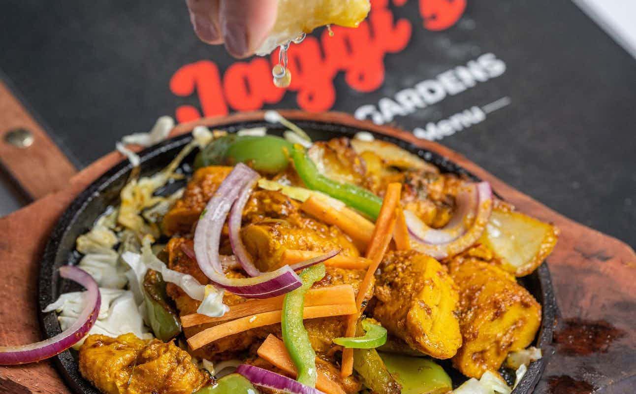 Enjoy Indian, Vegan Options, Vegetarian options, Halal, Restaurant, Bars & Pubs, Indoor & Outdoor Seating, Child-Friendly, Wheelchair accessible, $$, Groups and Live music cuisine at Jaggi's at Regal Gardens in Annangrove, Sydney