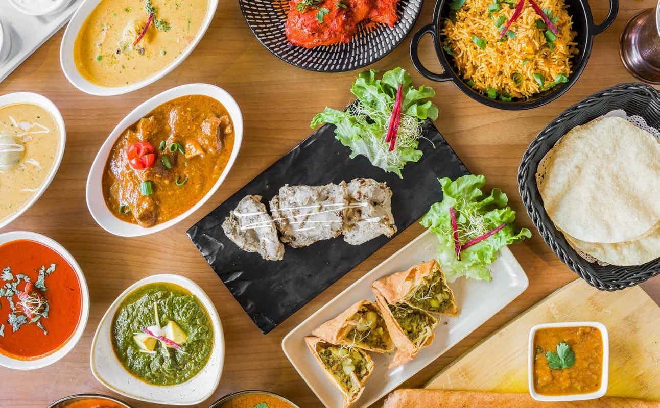 Enjoy Indian, Vegan Options, Vegetarian options, Halal, Restaurant, Highchairs available, Table service, Street Parking, Wheelchair accessible, $$, Groups and Families cuisine at Indian Paradise in Randwick, Sydney
