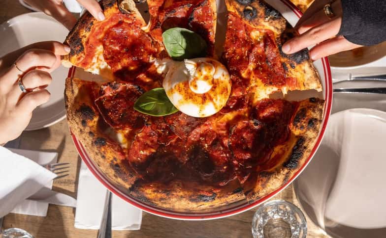 Papa Rolly's: 50% off the first table of the night with First Table