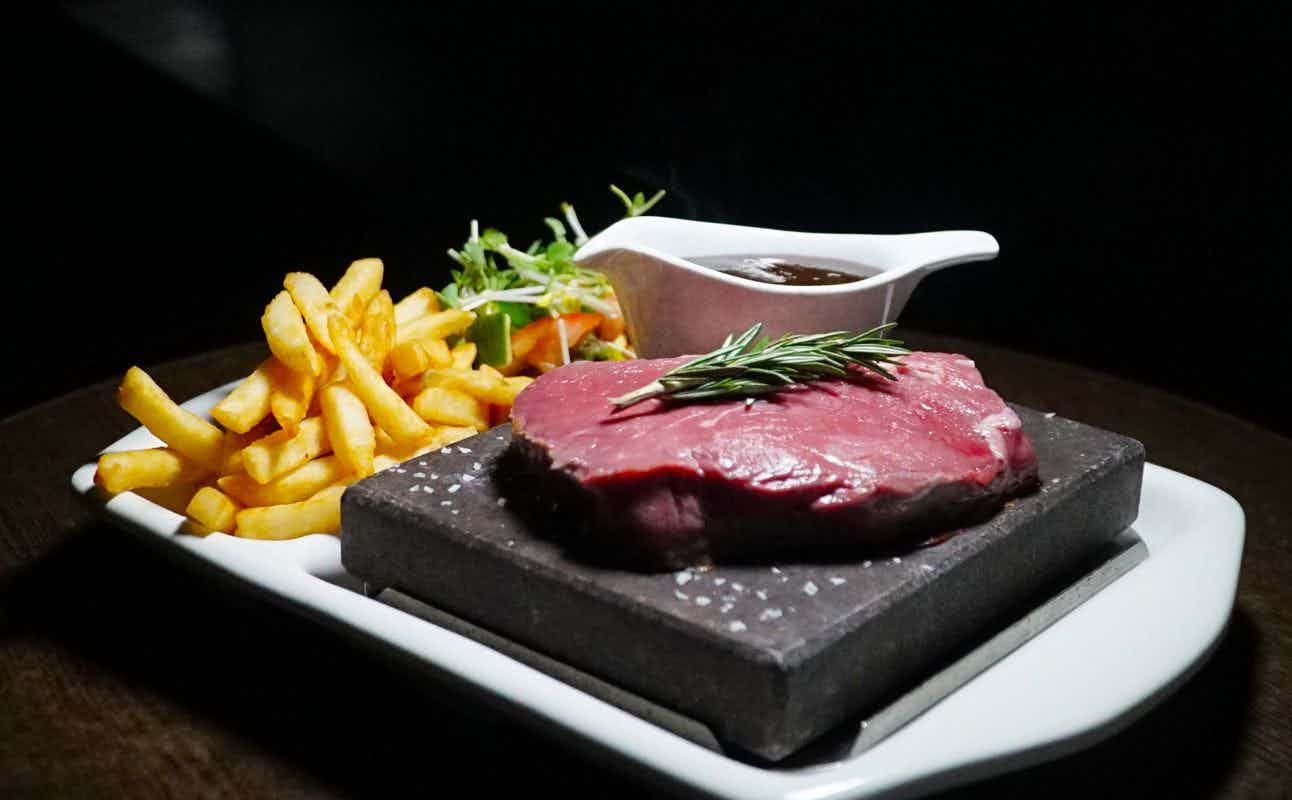 Enjoy Burgers, Grill & Barbeque and Steakhouse cuisine at JB's Bar & Grill in Darling Harbour, Sydney