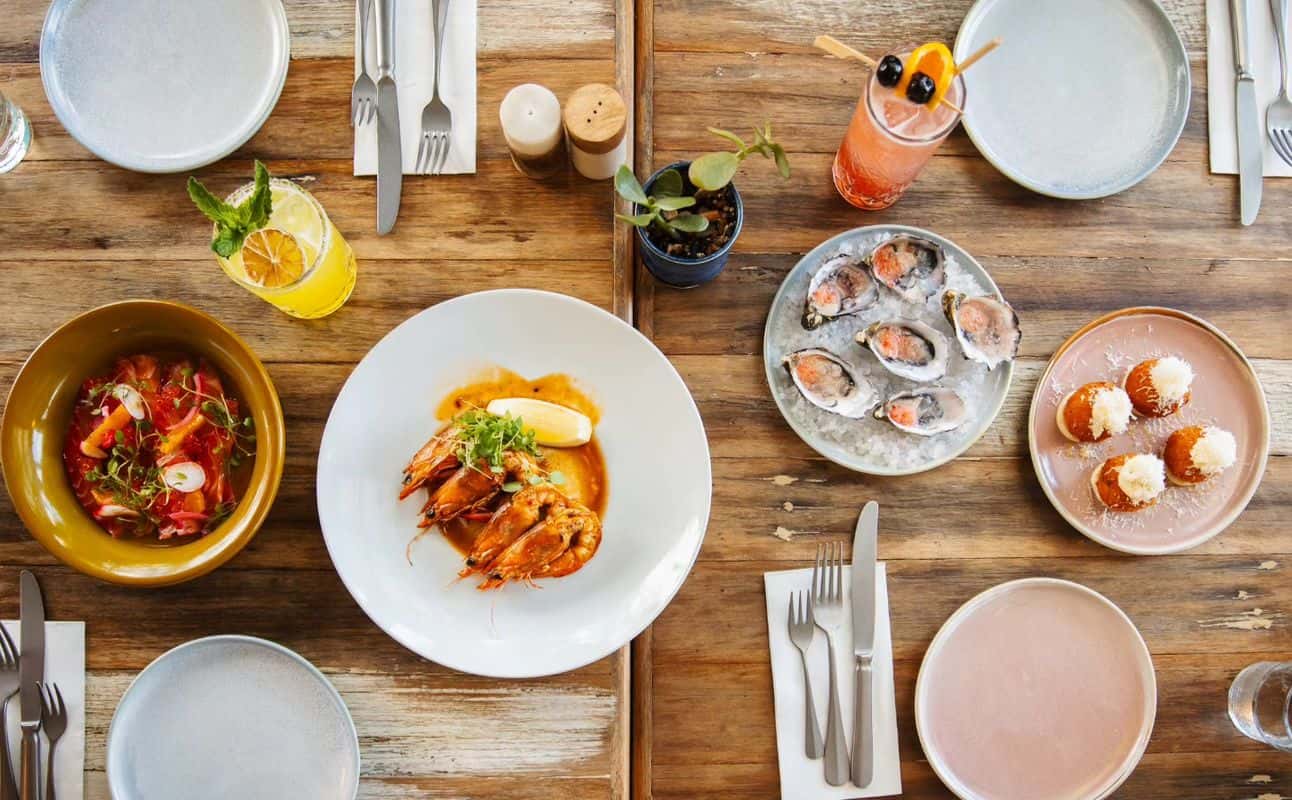 Enjoy Australian, Grill & barbeque, Seafood, Vegetarian options, Vegan options, Gluten Free options, Restaurant, Indoor & outdoor seating, Non-smoking, Highchairs available, Street parking, Wheelchair accessible, Table service, $$$, Families and Groups cuisine at Six Beaches Fish Grill and Bar in Point Lookout, Brisbane