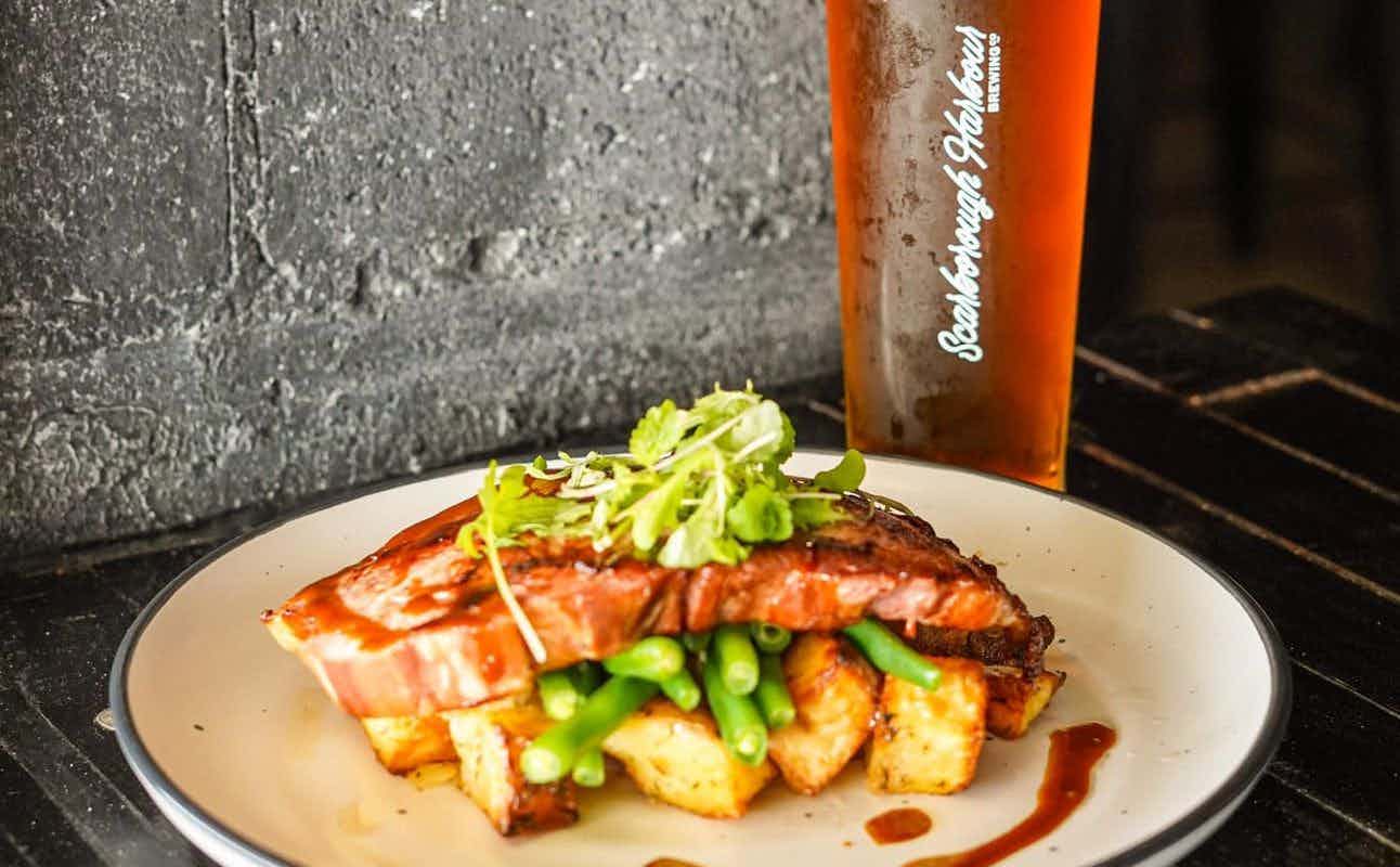 Enjoy Australian, Pub Food, Dairy Free Options, Gluten Free Options, Vegan Options, Vegetarian options, Bars & Pubs, Indoor & Outdoor Seating, $$, Groups, Craft Beer and Views cuisine at The Upper Deck - Scarborough Harbour Brewing Co. in Scarborough, Brisbane