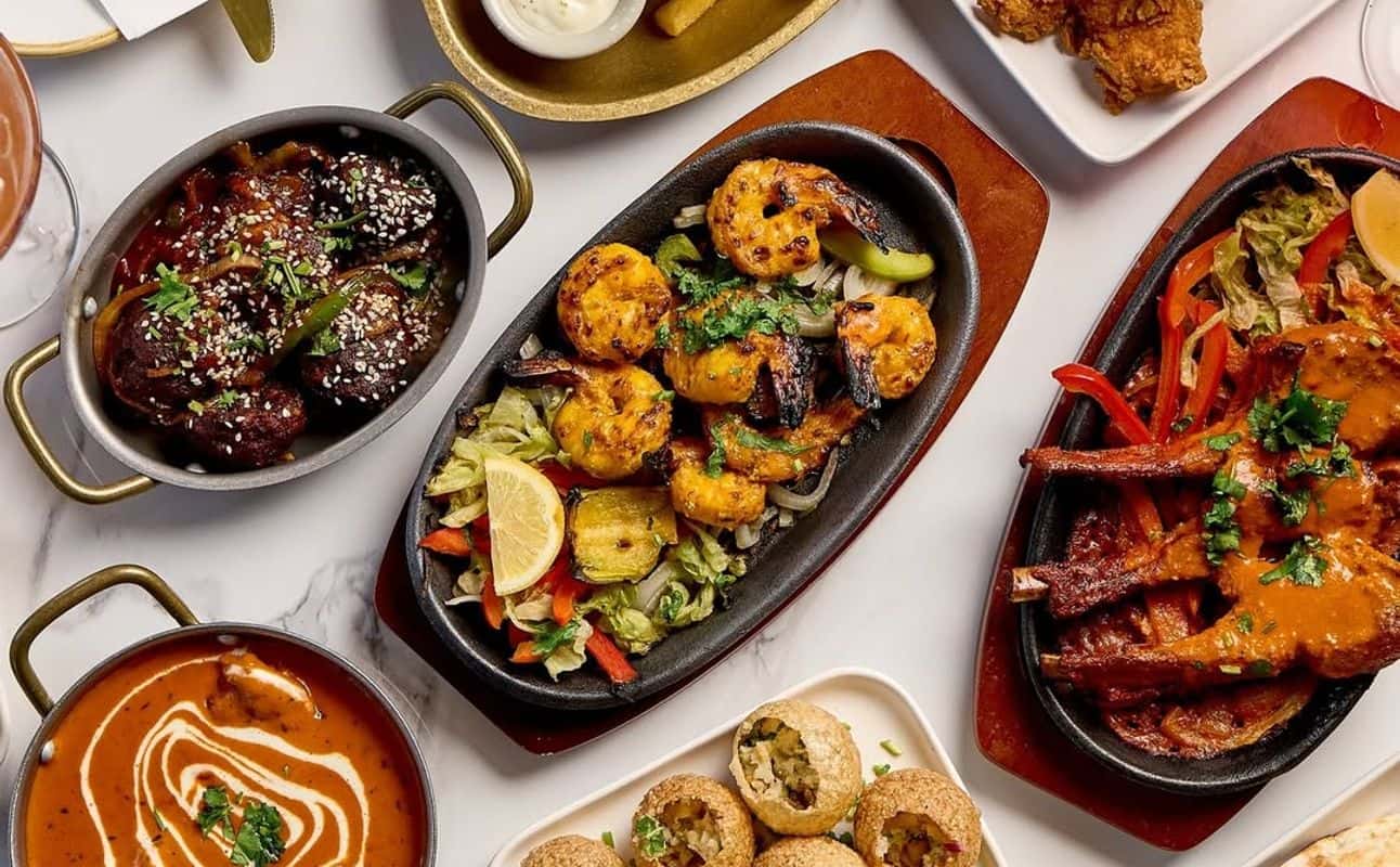 Enjoy Indian, Vegetarian options, Vegan options, Restaurant, Free wifi, $$$, Groups, Hidden gems and Live music cuisine at Slumdog Indian in Port Melbourne, Melbourne