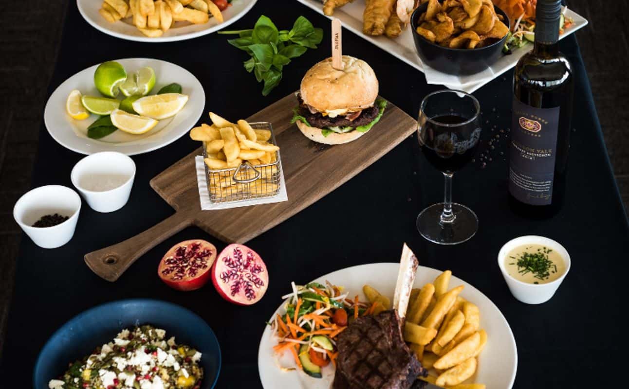 Enjoy Australian, Vegetarian options, Gluten Free options, Restaurant, Waterfront, Highchairs available, Indoor & outdoor seating, Wheelchair accessible, $$$, Live music, Families and Groups cuisine at Glenelg Surf Club in Glenelg, Adelaide