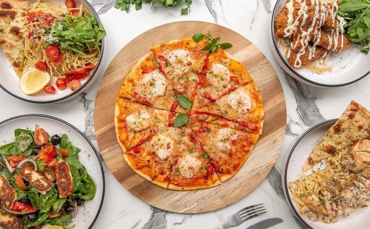 Enjoy Burgers, Pizza, Halal, Vegan options, Gluten Free options, Restaurant, Street parking, Indoor & outdoor seating, $$ and Groups cuisine at Haus of Mez in Brighton-Le-Sands, Sydney