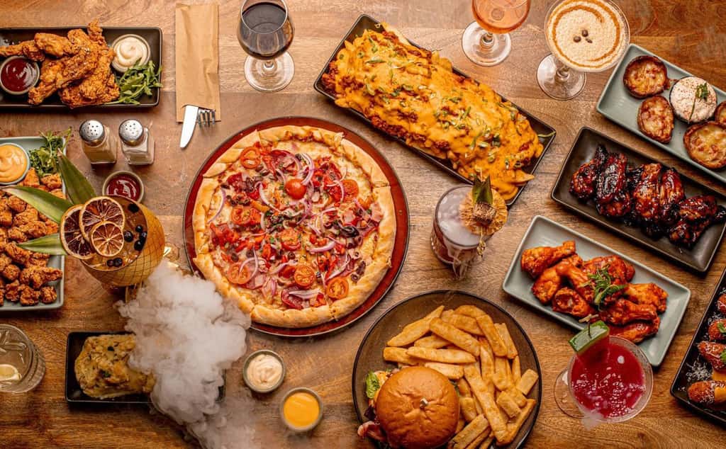 Papa Rolly's: 50% off the first table of the night with First Table